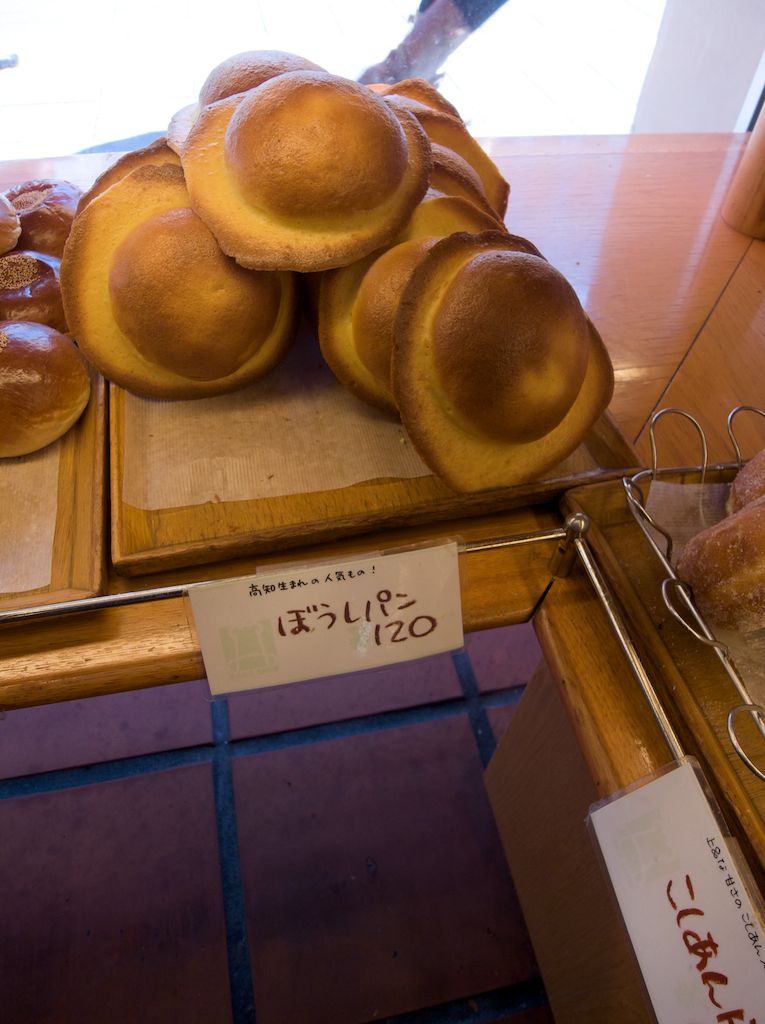 Kochi Hat Bread. Hat bread is a specialty of Kochi. It is a sweet flavored bread baked in the shape of a wide brim hat. You can find it at local bakeries and at the train station. 