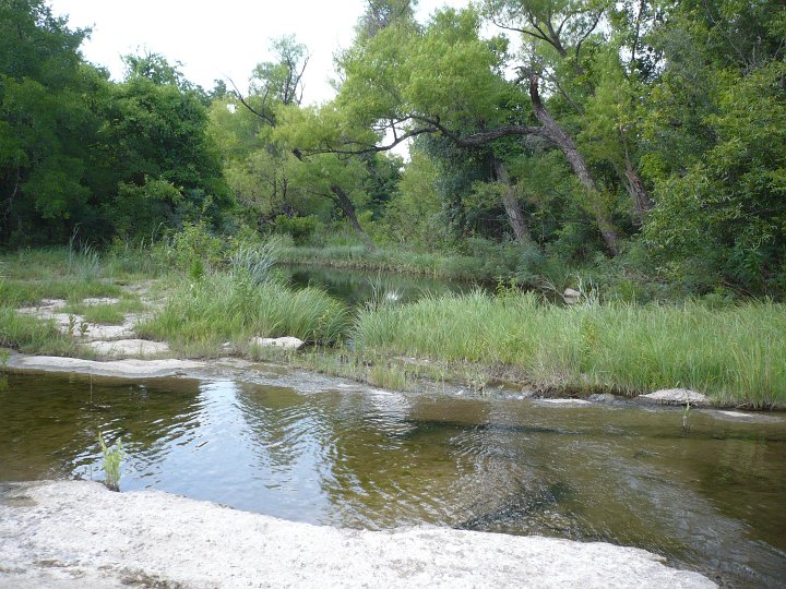 Park Road 61 crosses the Lost Creek Ford as it winds through Fort Richardson State Park and Historic Site. For day-trippers, choose a nearby picnic parking space and take a walk along the scenic and comfortable Lost Creek Nature Trail.