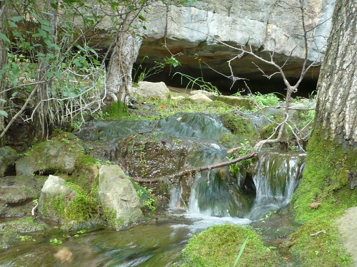 Once serving as the carry-in water supply for Fort Richardson, Rumbling Springs today is a popular site for visitors to the state park. Taking the Rumbling Springs Path from either of its trailheads, soft bubbling rumblings soon come within hearing range. The path runs from Park Road 61 across from the fort buildings and parade ground to Park Road 61 across from campsite 13.