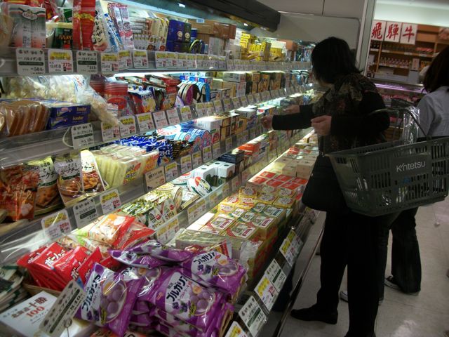 Many Japanese grocery stores have complete cheese aisles, as shown in this photo. So what is the big deal, you ask? Well, a friend of Village Hiker who lived in China for multiple years said she could purchase cheese only from a pizza baker in her city. In her case the pizza business made an exception. Anyway, while in Japan some of the flavors are different from what you may know outside of Japan, the basic cheese products are very similar to those found worldwide. You can find both cheese and cheese food.