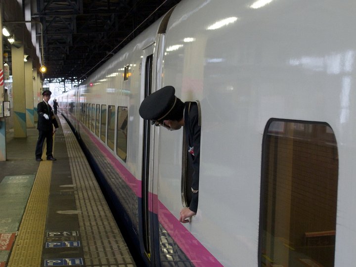 At Kitakami Station the Shinkansen conductor makes sure all passengers clear the train before the train continues to the next stop. The Shinkansen holds a perfect record of passenger safety since the first train ran in 1964.