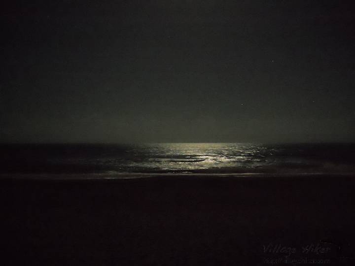 A full moon lights the Atlantic on 25 October 2010 at 9:06:20 pm EST, visible from the public boardwalk at Melbourne Beach, Florida. With this shot, a Nikon CoolPix L22 proves it can take *good enough* pictures in low light when held perfectly still. The sky shows some noise, while the ocean appears smoother than reality because of the long timing of the photo. Snapped with a Nikon Coolpix L22. Copyright 2010 by Village Hiker Publishing Company. All rights reserved. Please do not use without permission. Contact Village Hiker for digital reproduction and high-resolution prints.