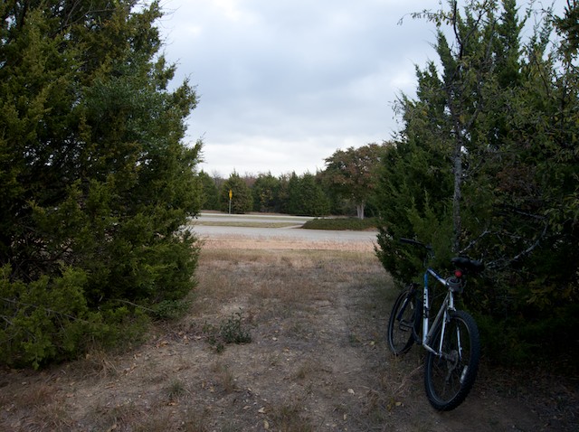 This photo shows one of the high parts of the Spring Creek Nature Area in Richardson, Texas. It is taken from a break in the trees along a second walking trail located south of park.