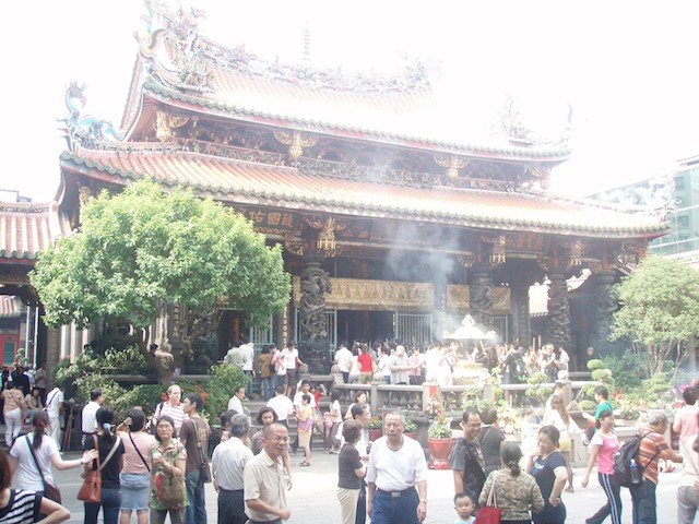 Incense fills the inner court of Lungshan Temple in Taipei, Taiwan.