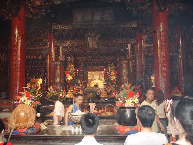 Worshippers burn incense and leave food offerings at the temple where Matsu is the primary goddess. The temple is located in the Dajia District of Taichung, Taiwan.
