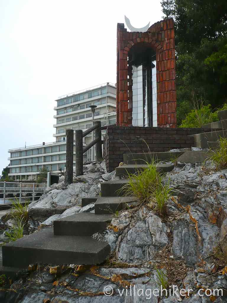 The silver crane sits on top of the dream bell.