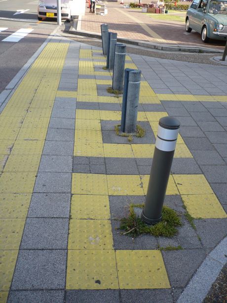 Beaded tactile tiles mark obstructions for the blind and near-blind in Japan